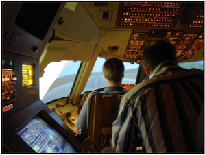UGA Atmospheric Sciences students in a Delta Air Lines flight simulator.