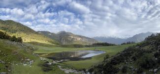 Image of a lake surrounded by mountains